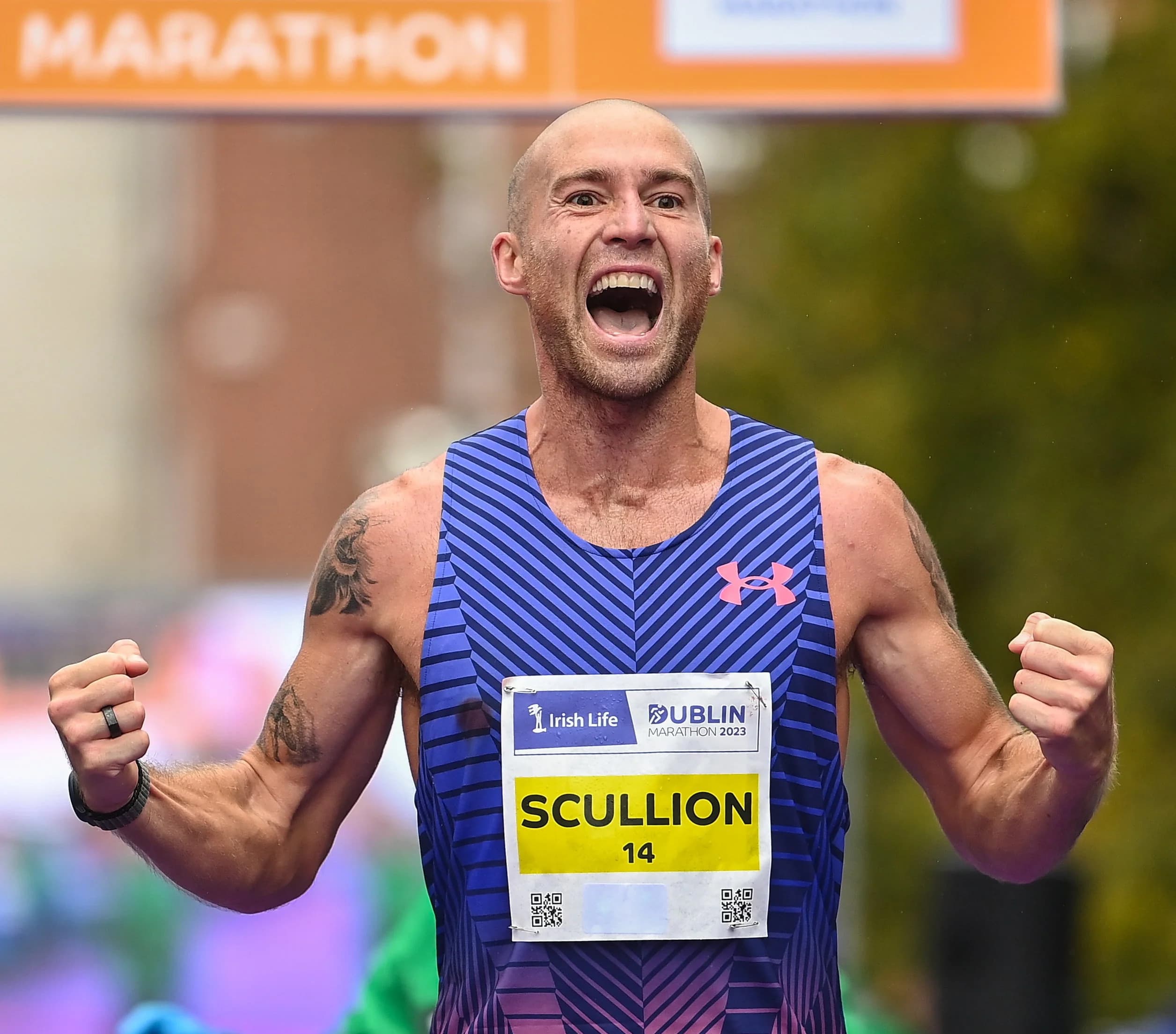 Stephen Scullion celebrating at the Dublin Marathon